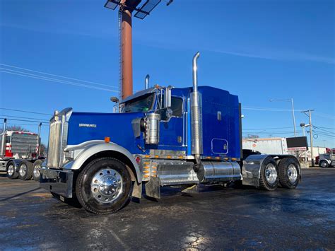 Truck is double framed with 20K fronts, 20k pusher and 46K rears. . Kenworth flat top sleeper for sale